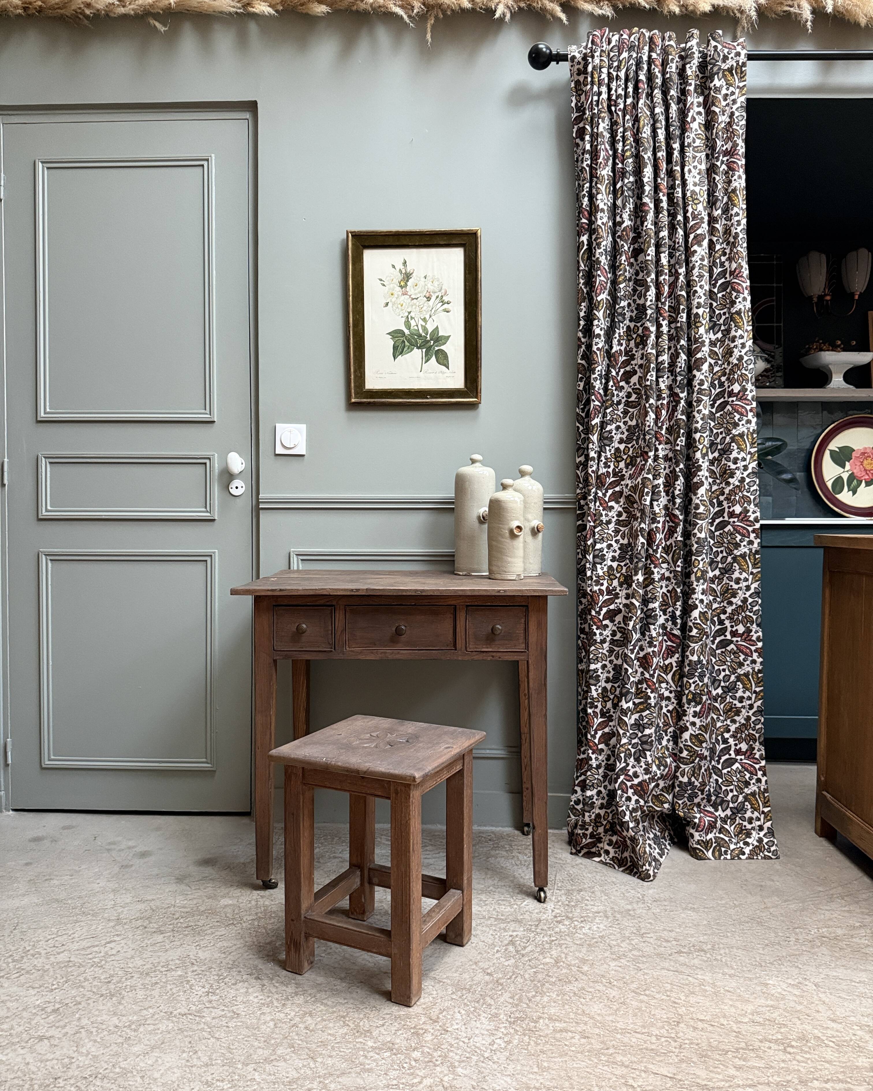 Small antique desk on wheels