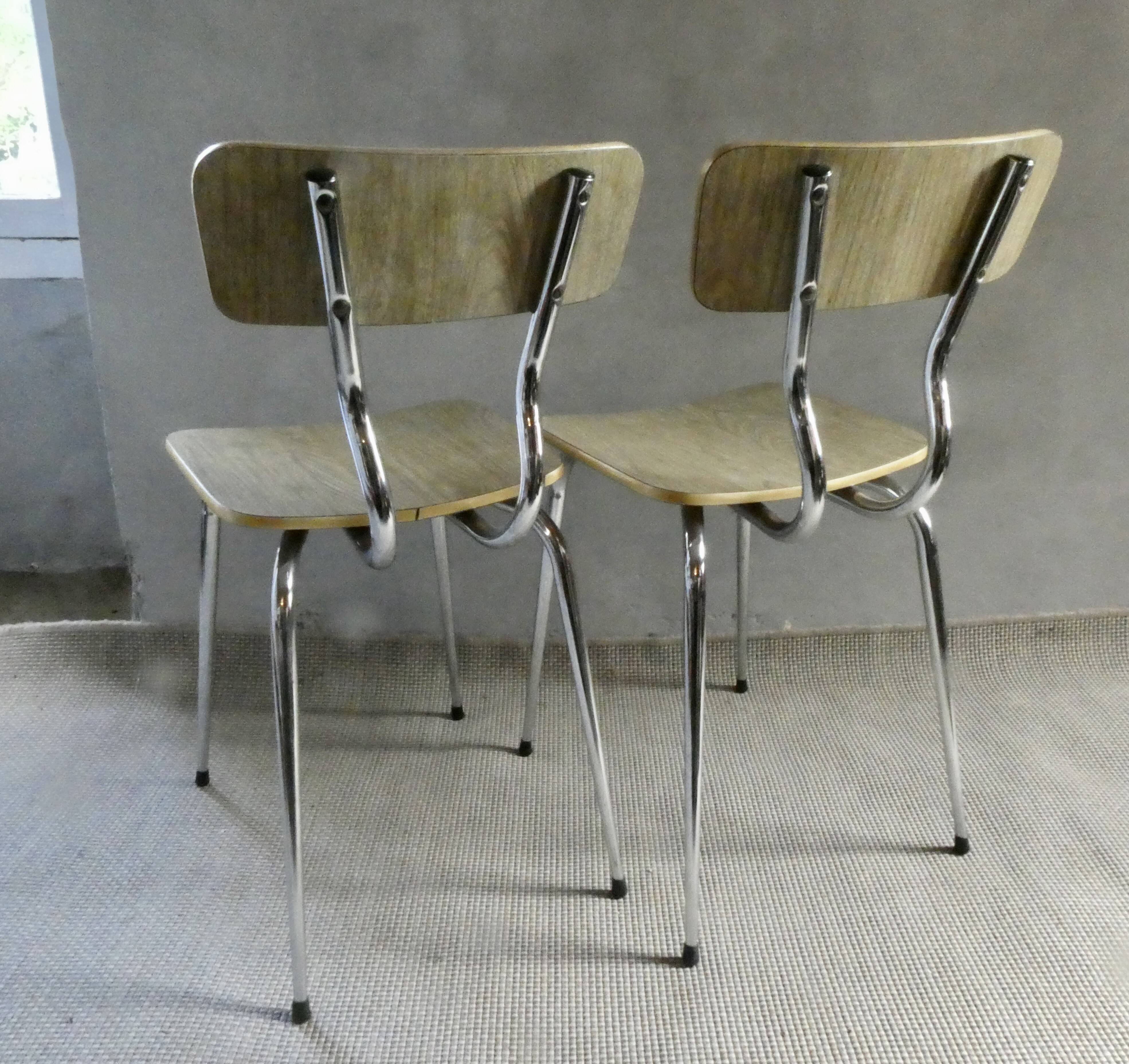 Pair of chairs in "wood" formica and gold edges, 1960s
