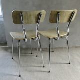 Pair of chairs in "wood" formica and gold edges, 1960s