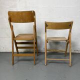 Pair of mismatched wooden folding chairs
