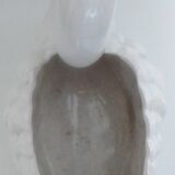 ceramic pot cover in the shape of a swan