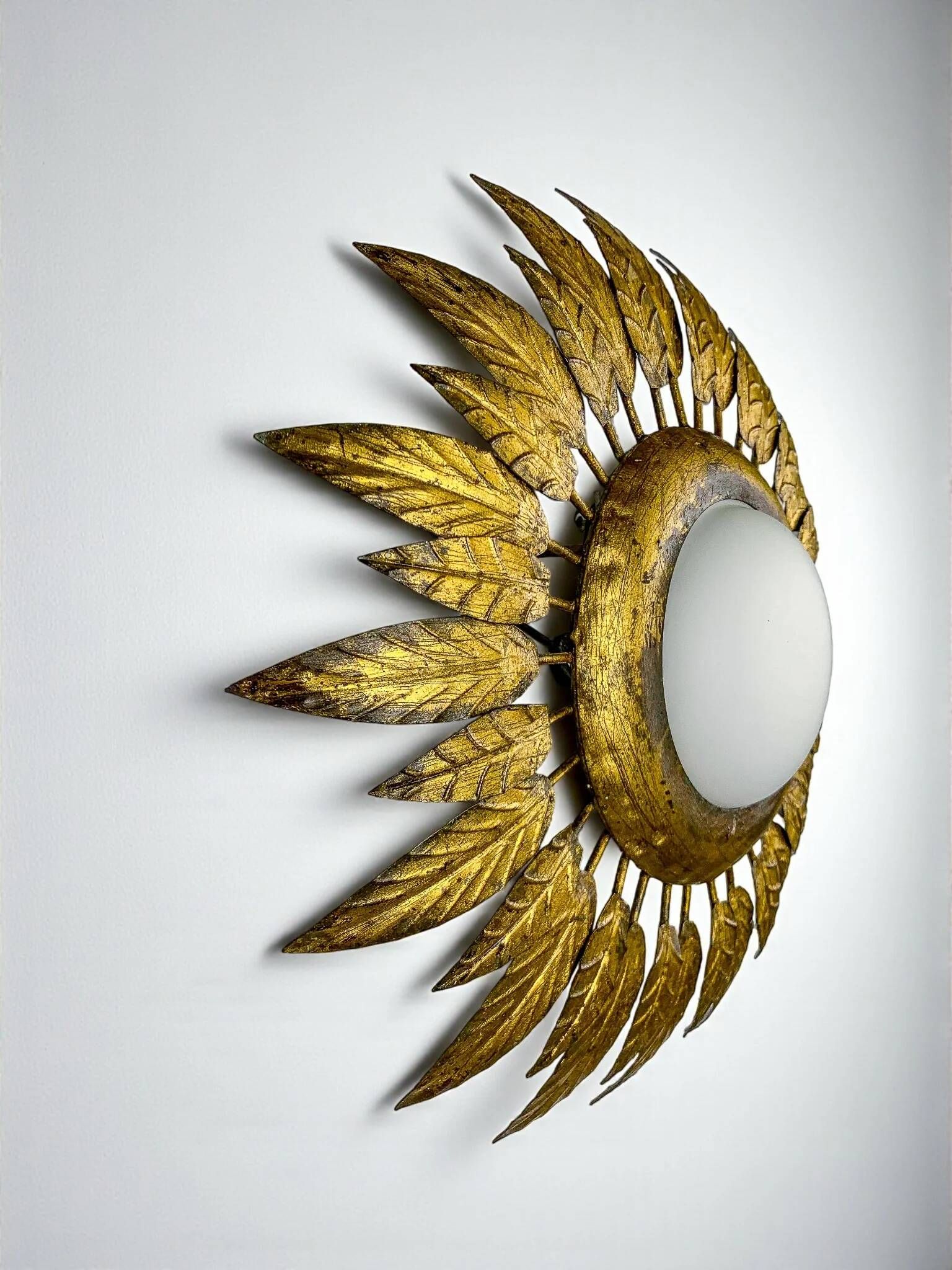 Spanish sunburst ceiling light – opaline glass & gilt iron foliage, 1960s