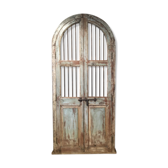 Ancient Indian gate in patinated wood