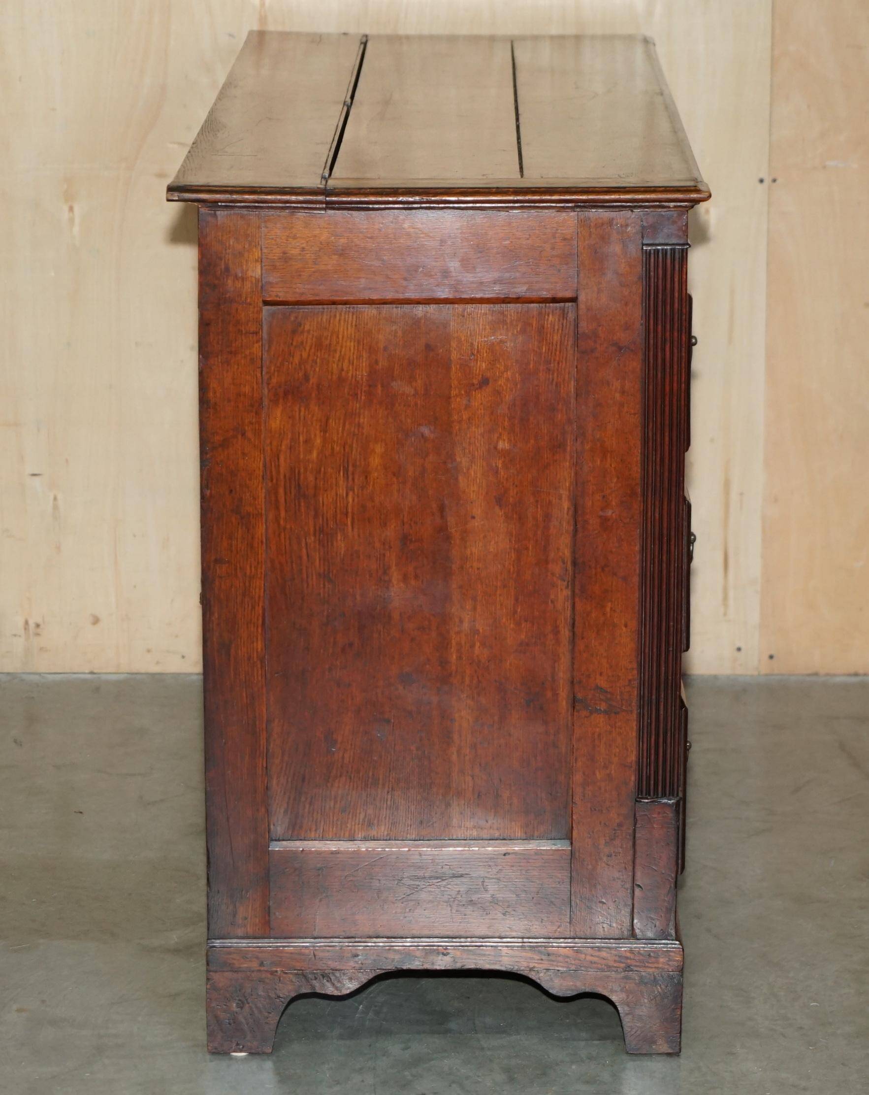 Georgian oak commode with a folding top, English, 18th century.