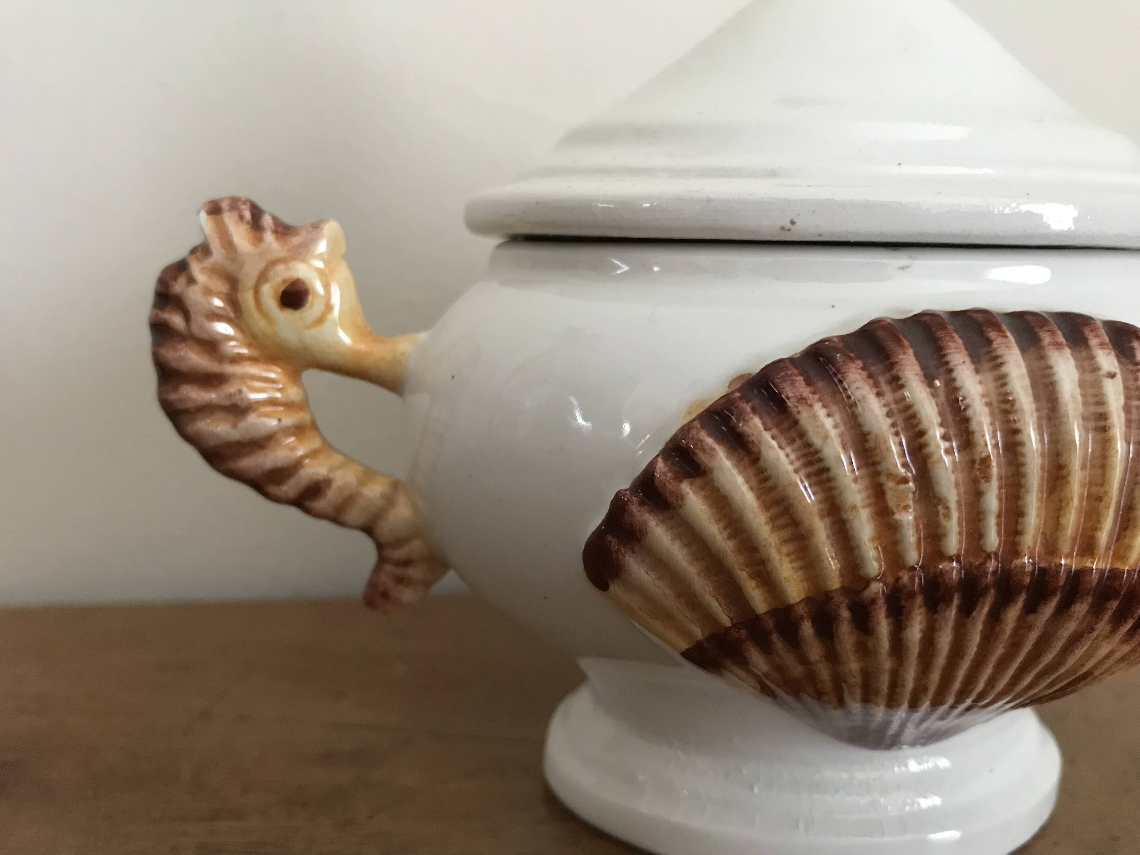 Zoomorphic covered pot decorated with seahorses