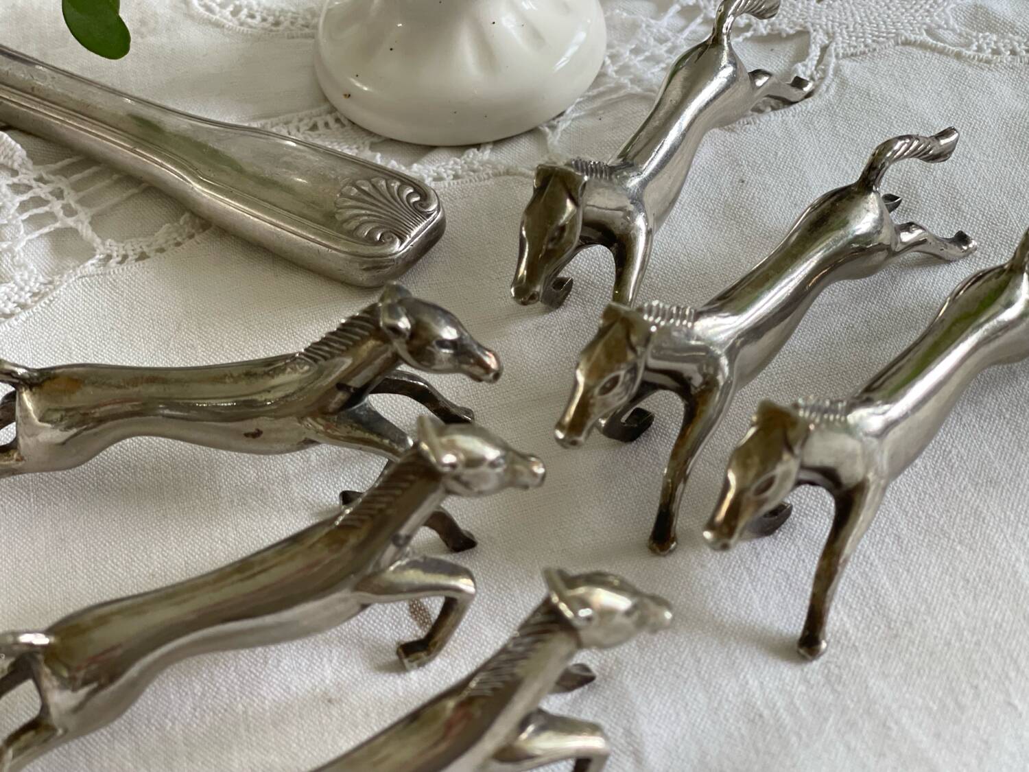 6 silver metal knife holders