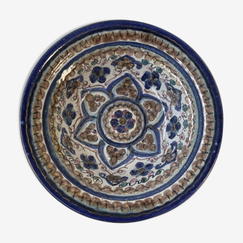 Decorative hollow plate in old ceramic wall decoration