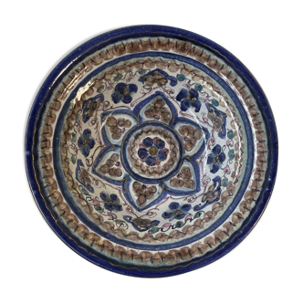 Decorative hollow plate in old ceramic wall decoration