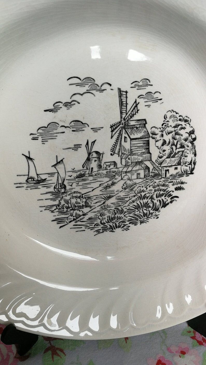 Large dish creux in faïence ancient motifs mill seaboard vintage sails