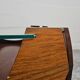 Mid-century coffee table in curved plywood with a glass top, 1940s.