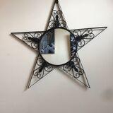 Miroir rond en fer forgé à forme d'étoile