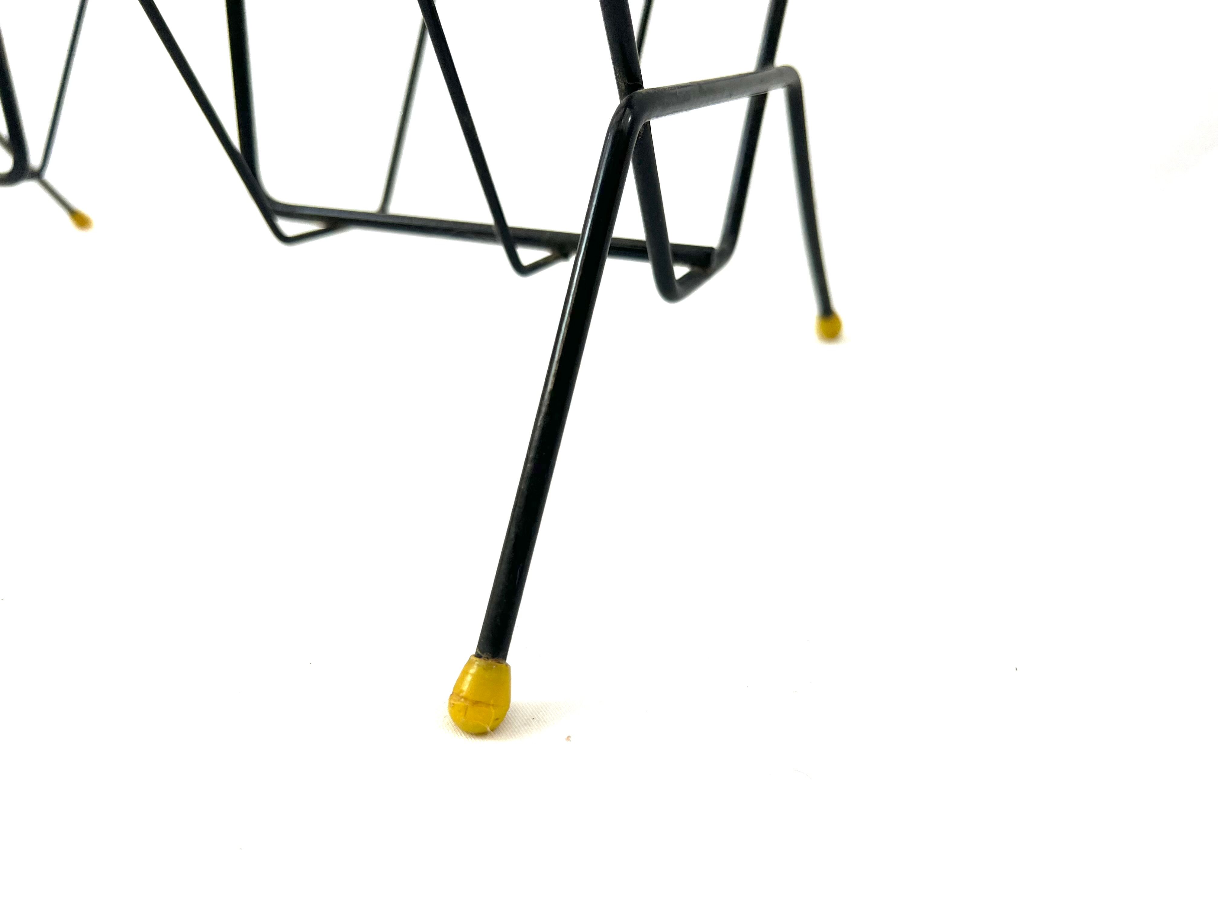Vintage black and yellow magazine holder and vinyl record holder