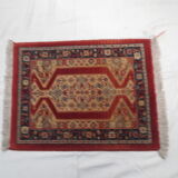 Old rectangular wool carpet, oriental decoration
