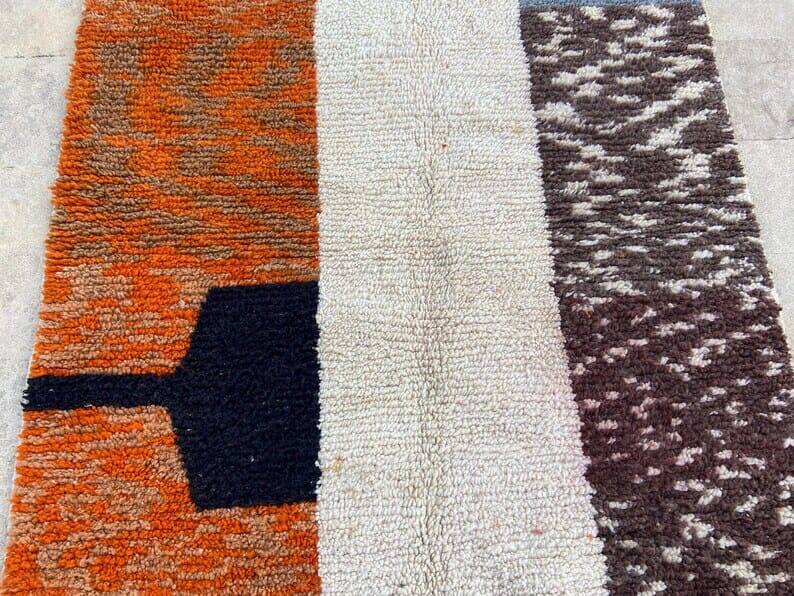 Handmade wool rug in colourful patterns, size 150x250 cm.