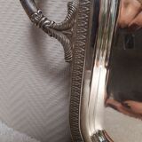 Silver-plated service tray with handles, neoclassical decoration.