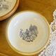 Assiette en grès et émail estampillée