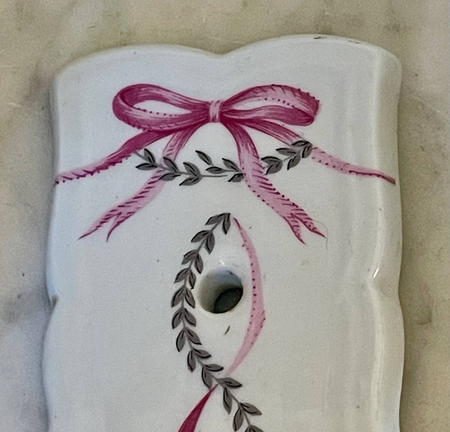 Pair of cut glass and Limoges porcelain wall sconces