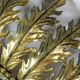 Large Italian sunburst wall mirror in gilded metal, 1960s-70s.