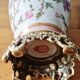 Porcelain and bronze vase