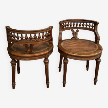 Pair of Louis XVI style walnut armchairs with canework and spools late 19th century