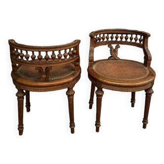 Pair of Louis XVI style walnut armchairs with canework and spools late 19th century