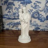 Statue of Saint Joseph and the infant Jesus in biscuit porcelain, early 20th century