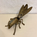 Gold metal ashtray fly