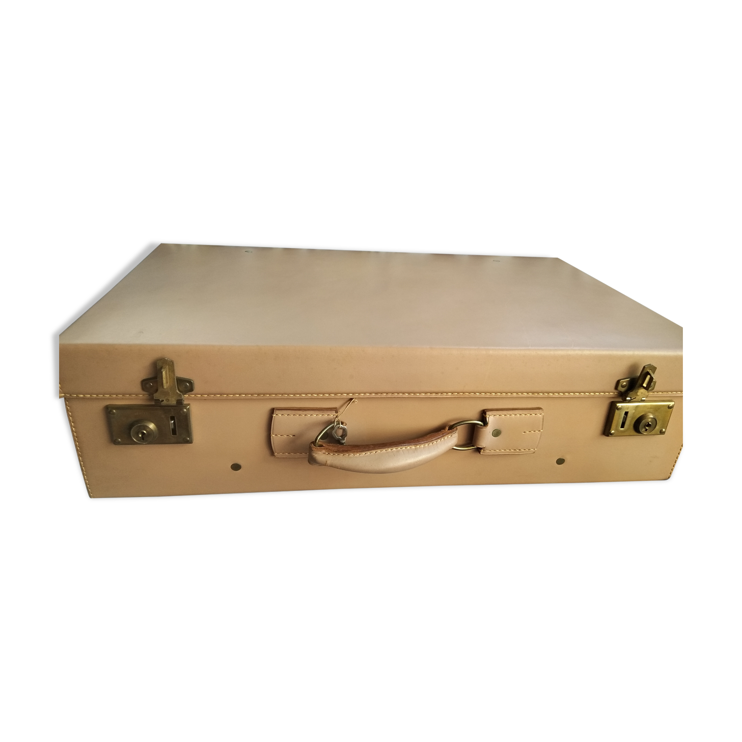 Old leather suitcase with its protective cover