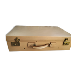 Old leather suitcase with its protective cover