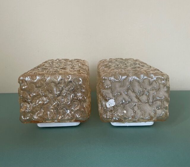 Two Limburg wall lamps in amber glass, circa 1960