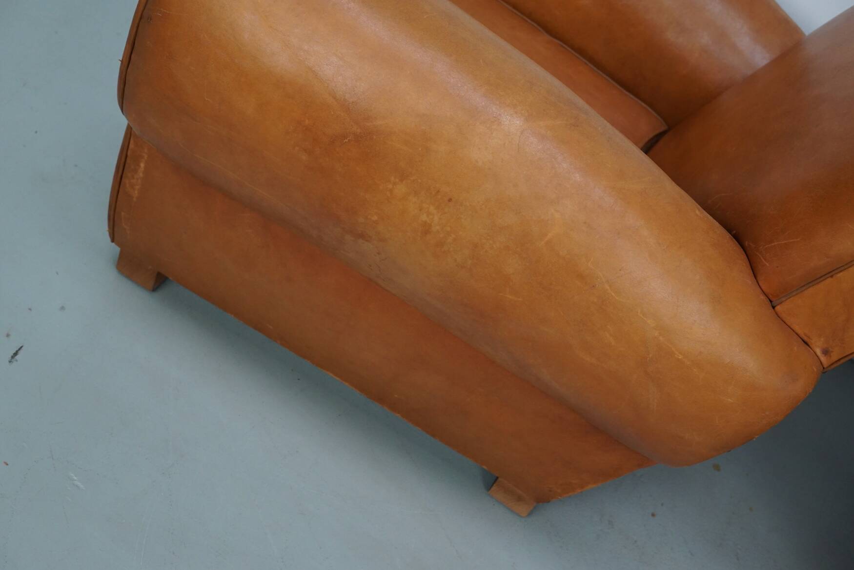 Pair of French club chairs with moustache back in cognac leather, 1950s