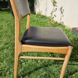 Scandinavian chair with faux leather seat and back