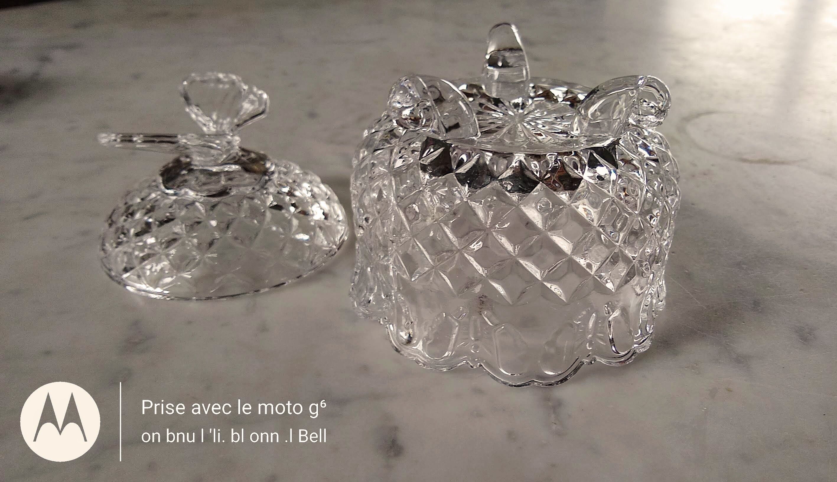 Glass bonbonnière cut with a butterfly pattern