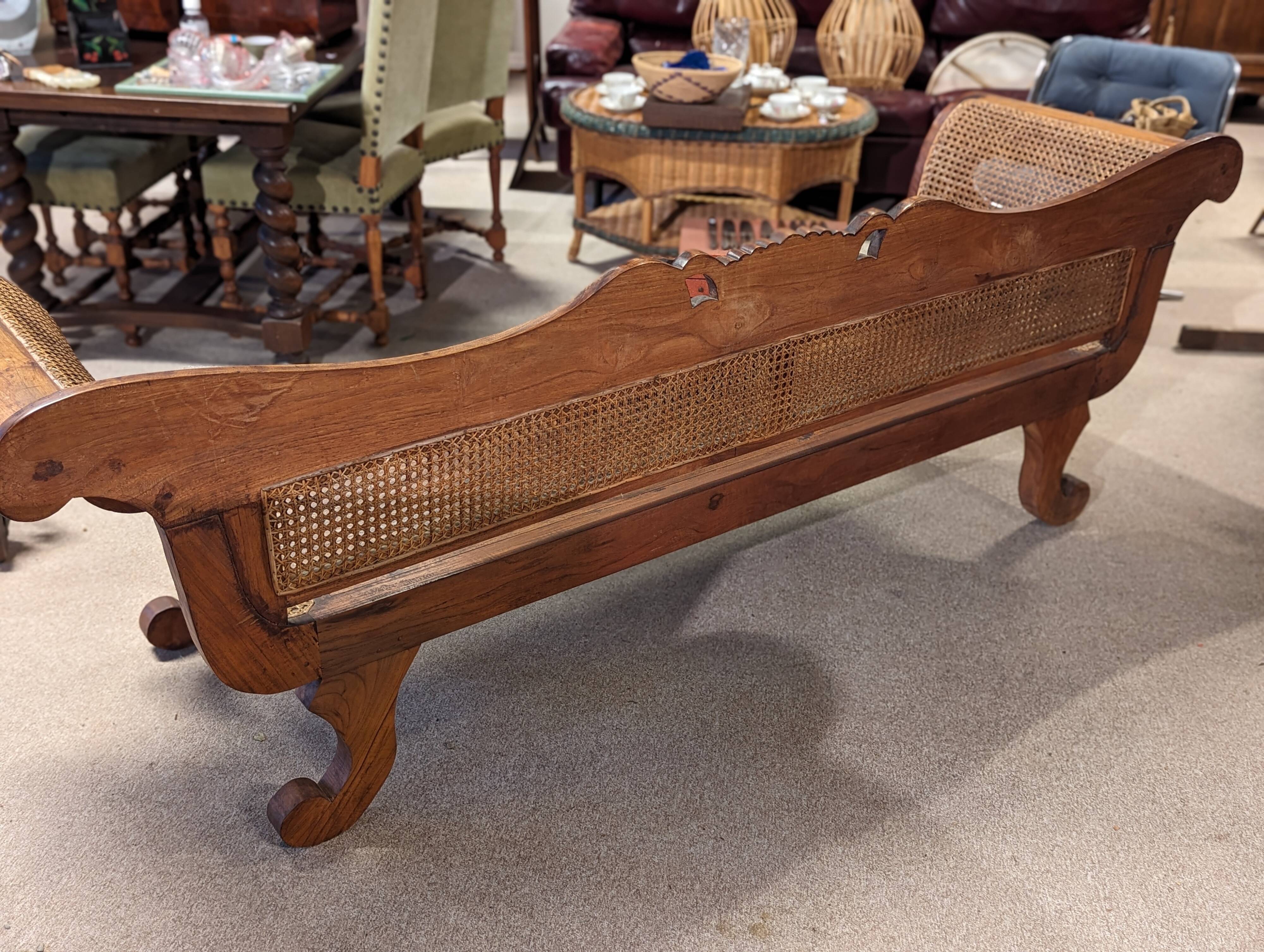 Large colonial caned bench