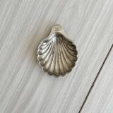 Small metal pocket emptier