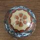 Egg-shaped porcelain jewelry box with asisaisues motifs