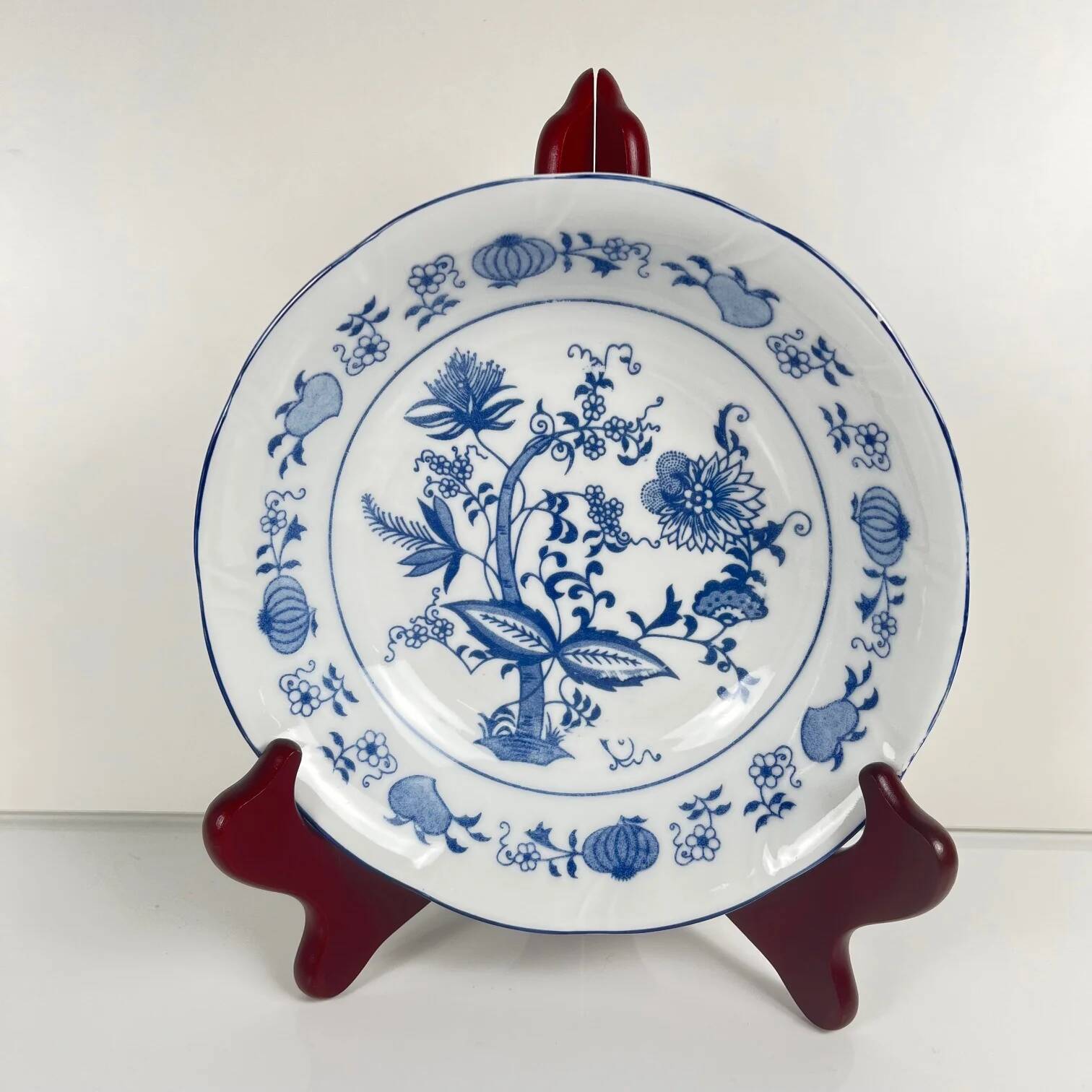 4 bowls / small dishes with blue onion pattern