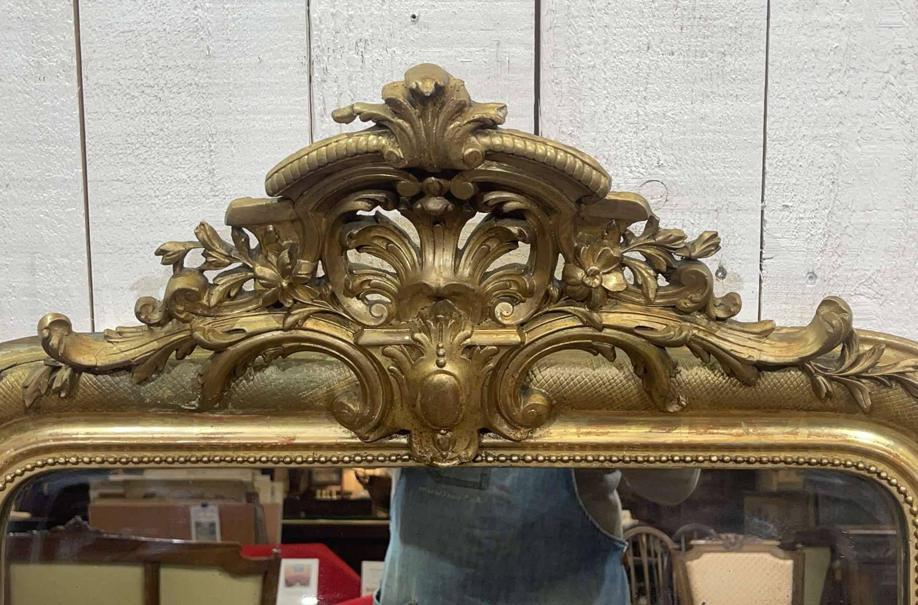 Miroir Louis XV fin XIXème en bois doré