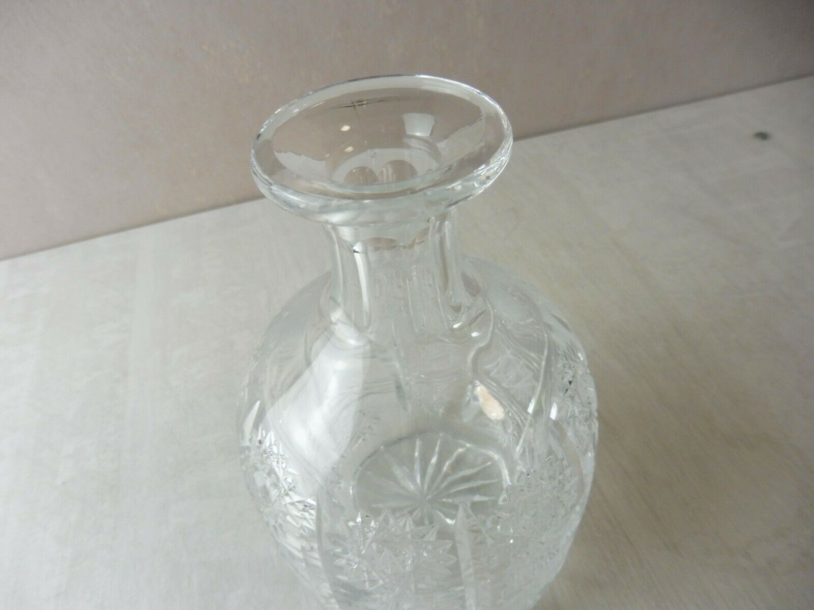 Old carved crystal decanter, star décor