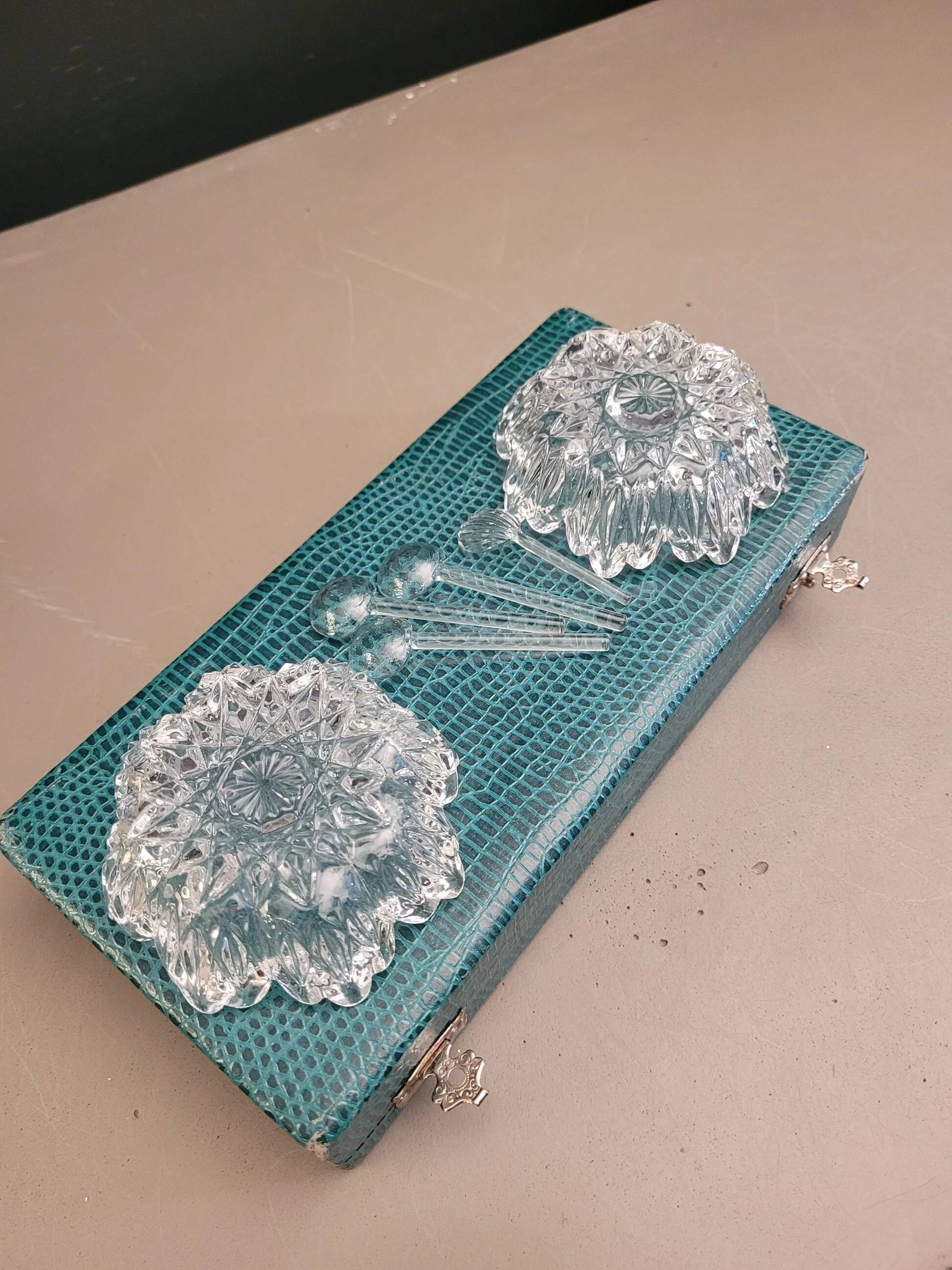 Pair of crystal salt cellars with spoons