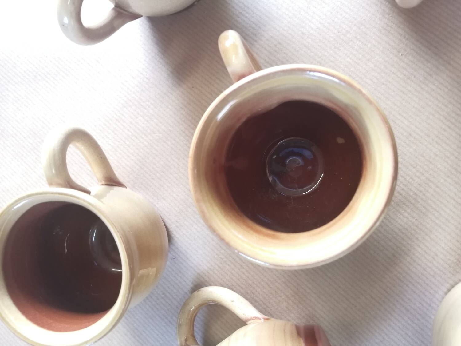 Set of 7 vintage stoneware yellow coffee cups