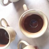 Set of 7 vintage stoneware yellow coffee cups