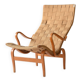 “Pernilla” armchair and footstool designed by Bruno Mathsson
