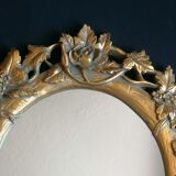 Miroir doré en résine à décor floral