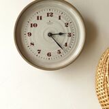 Clock in the shape of a round plate Junghans