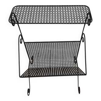 Black metal magazine rack