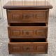 Vintage bedside cabinet with three drawers in moulded wood, Louis XV style.