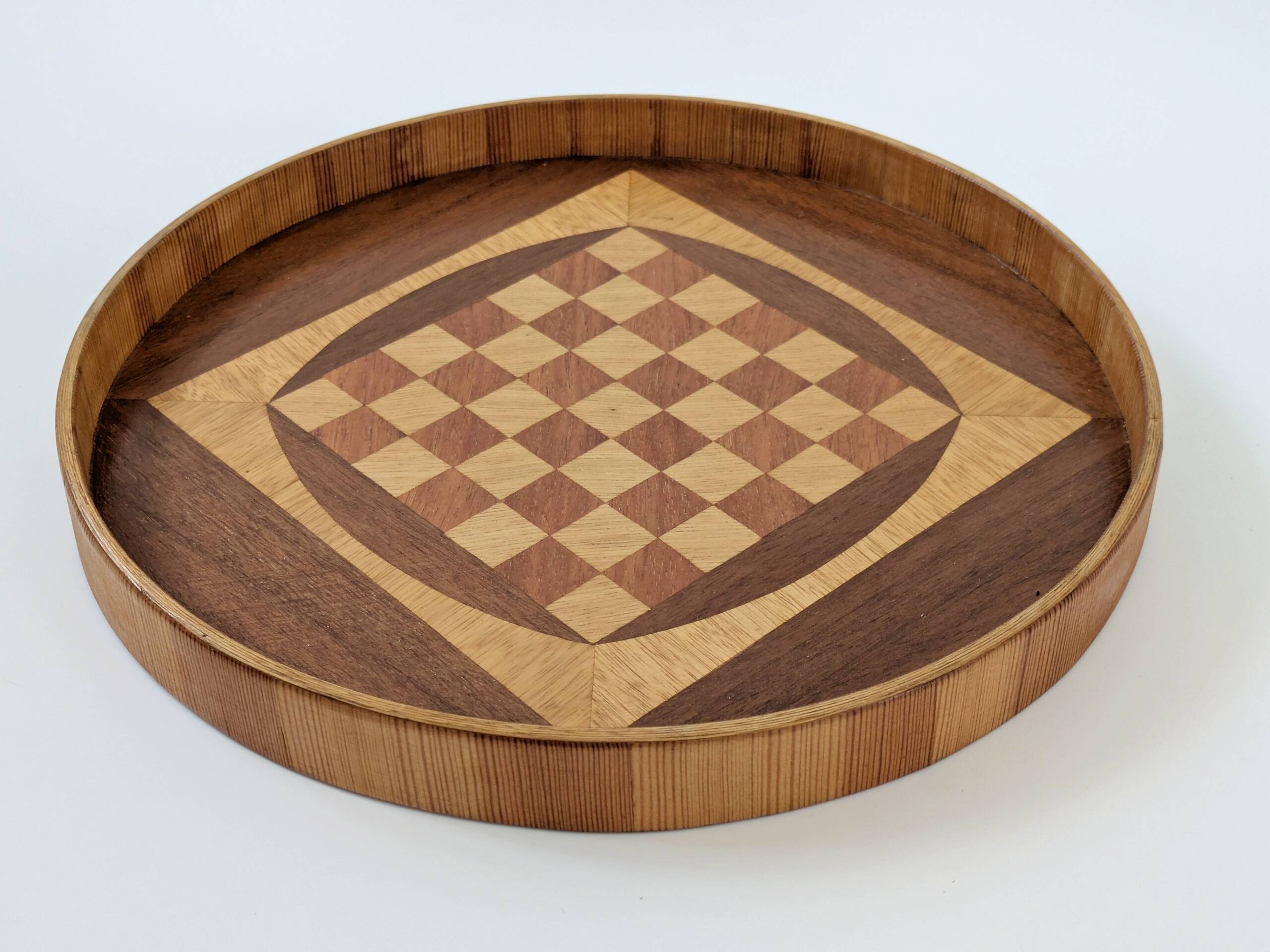 Round checkered tray in marquetry wood, vintage design from the 60s