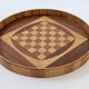 Round checkered tray in marquetry wood, vintage design from the 60s