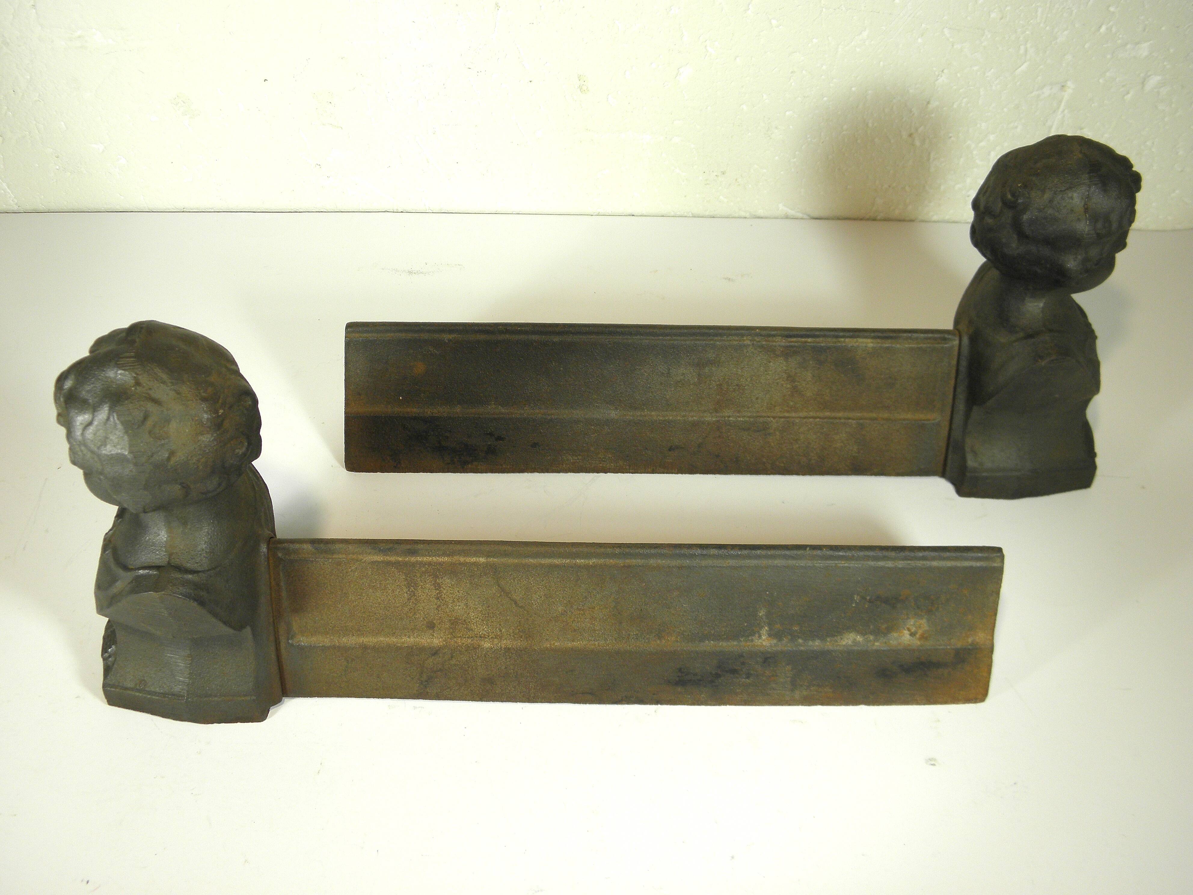 Pair of cast iron fire dogs